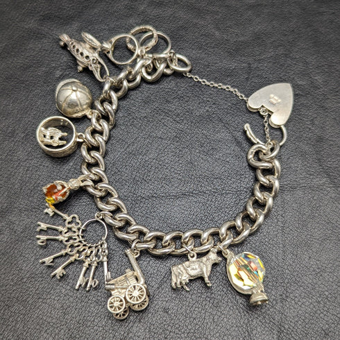 British vintage sterling silver charm bracelet 71g